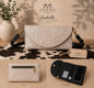 Isabella tooled leather phone wallet crossbody in ivory - multi-view showing tooled front, back zip pocket, and interior card slots